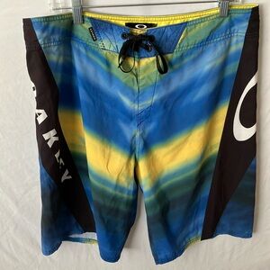 Oakley: Blue & Yellow Board Shorts- 36